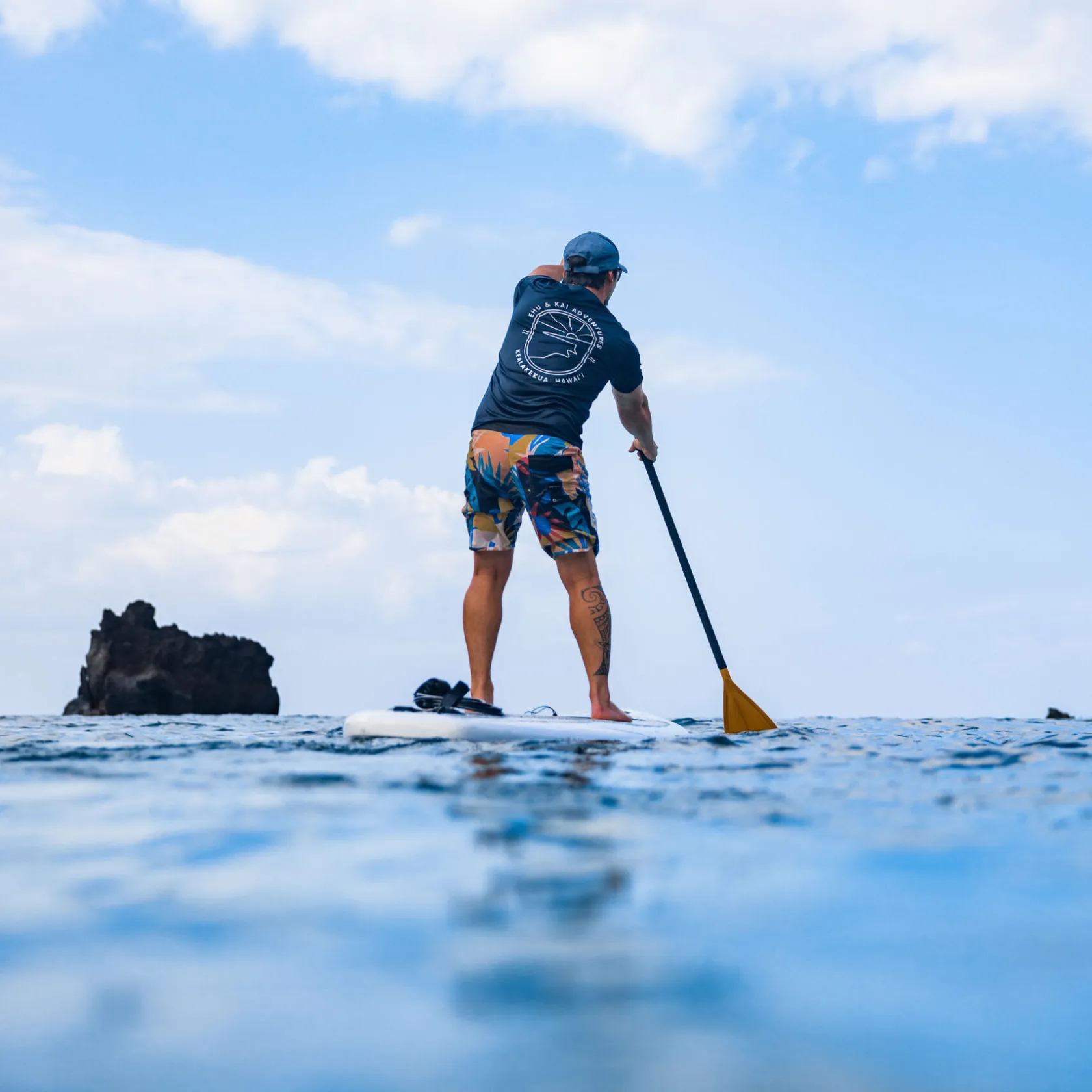 a man riding skis down a snow covered slope